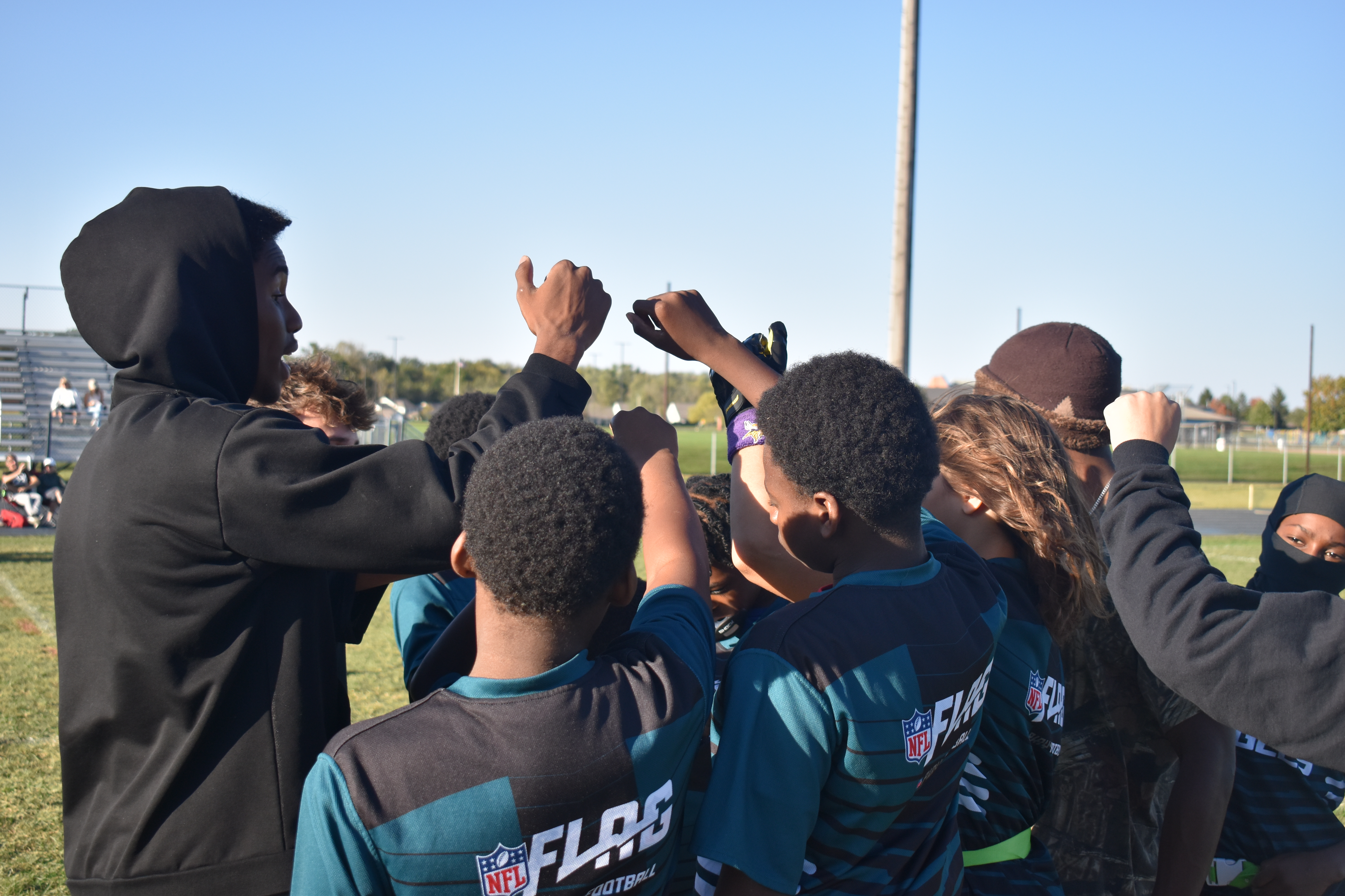 Team huddle during a youth sports event