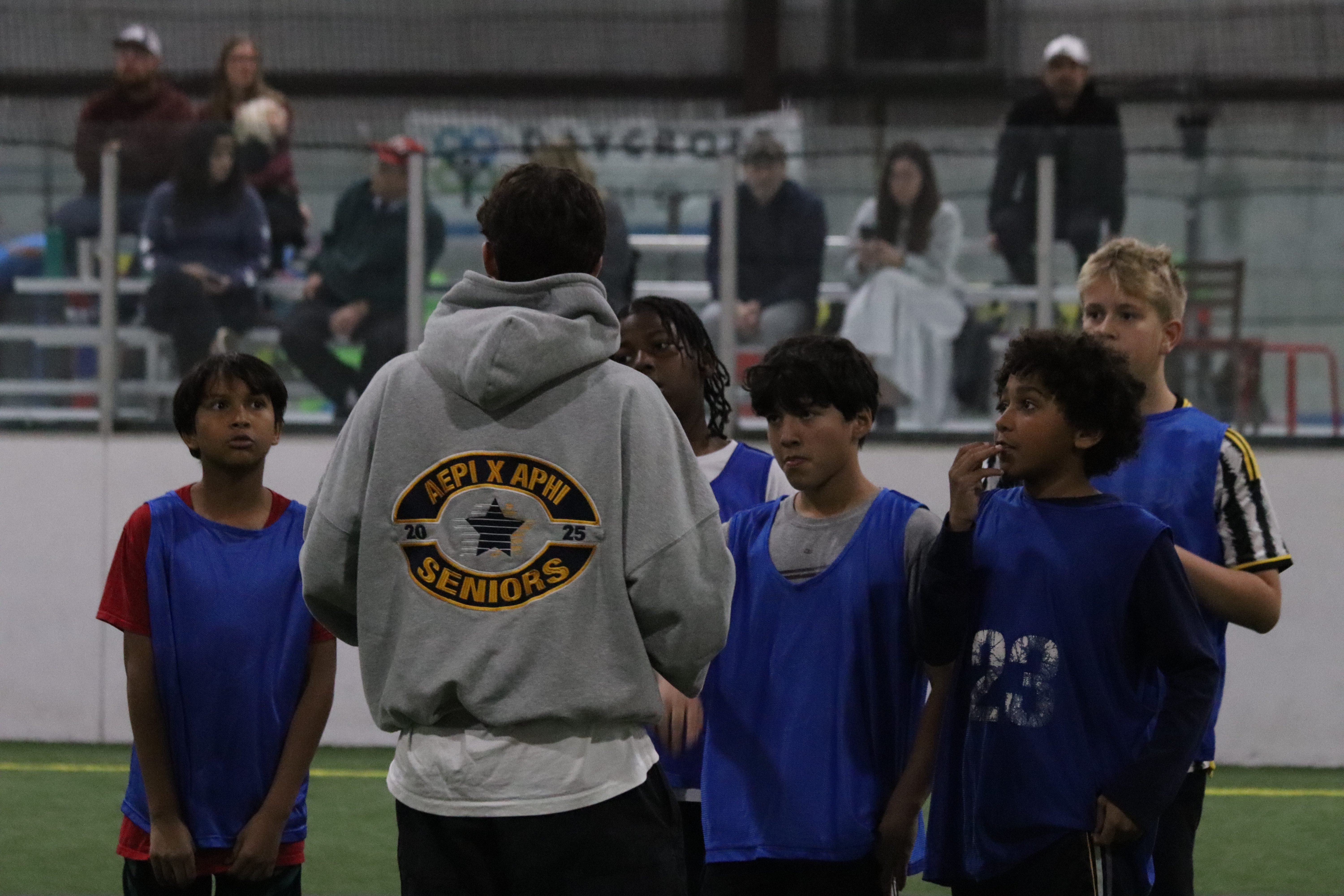 Youth sports participants engaging in a team activity